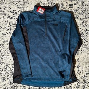 Men’s XL North Face quarter zip jacket.